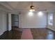 Expansive main bedroom features tray ceilings, recessed lighting, and dual entry doors at 354 Mansfield Way, Stockbridge, GA 30281