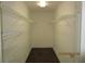 Spacious walk-in closet featuring wire shelving for ample storage and organization of clothing and accessories at 354 Mansfield Way, Stockbridge, GA 30281