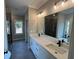 Double vanity bathroom with a soaking tub and shower at 157 Clay Wade Dr, Canton, GA 30114