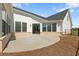 Spacious backyard patio, perfect for outdoor entertaining and relaxation at 5225 Maggie Mae Ln, Cumming, GA 30028