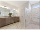 Elegant bathroom with double vanities, a separate shower, and luxurious finishes at 5225 Maggie Mae Ln, Cumming, GA 30028