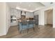 Stylish kitchen with a center island, modern appliances, and ample cabinet space at 5225 Maggie Mae Ln, Cumming, GA 30028