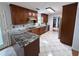 Updated kitchen featuring granite countertops, stainless appliances, and tile floors at 300 Redford Trl, Stockbridge, GA 30281