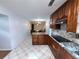 Modern kitchen featuring granite countertops and stainless steel appliances at 300 Redford Trl, Stockbridge, GA 30281