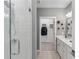 Modern bathroom with tile shower, decorative tile floor and walk-in closet at 371 Grant Se Cir # 1814, Atlanta, GA 30315