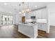 Modern kitchen featuring stainless appliances, center island with marble countertop and stylish pendant lighting at 371 Grant Se Cir # 1814, Atlanta, GA 30315