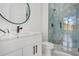 Modern bathroom with marble-look vanity and glass shower at 1660 Union Grove Church Rd, Auburn, GA 30011