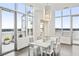 Modern dining room with access to a balcony at 2828 Peachtree Nw Rd # Ph3300, Atlanta, GA 30305