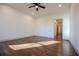 Well-lit bedroom with hardwood floors and ceiling fan at 279 Laura Cir, Bowdon, GA 30108