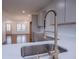 Modern kitchen with stainless steel sink and faucet at 279 Laura Cir, Bowdon, GA 30108