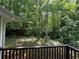 Spacious deck overlooking a private wooded backyard at 194 Spring Leaf Dr, Dallas, GA 30157