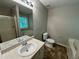 Bathroom with a bathtub, shower, sink and toilet at 194 Spring Leaf Dr, Dallas, GA 30157