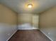 Spacious bedroom with carpeted floor and neutral walls at 194 Spring Leaf Dr, Dallas, GA 30157