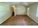 Living area with staircase, high ceiling, and carpeted floor at 194 Spring Leaf Dr, Dallas, GA 30157