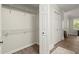 Spacious walk-in closet with ample shelving and built-in storage at 7445 Talbot, Sandy Springs, GA 30328