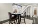 Modern dining area with a unique table and stylish lighting at 7445 Talbot, Sandy Springs, GA 30328