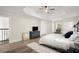 Main bedroom with a king-size bed and a ceiling fan at 7445 Talbot, Sandy Springs, GA 30328