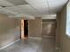 The basement has tiled floors, storage space, and access to other areas at 3715 Leisure Ln, College Park, GA 30349