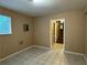 The finished basement offers tile floors, a window and access to stairs at 3715 Leisure Ln, College Park, GA 30349