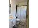 Clean bathroom with bathtub, shower, and vanity offers a functional and refreshing space at 3450 Camellia Ln, Suwanee, GA 30024