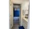 The bathroom features a shower with dolphin curtains and a tiled floor and white vanity at 3450 Camellia Ln, Suwanee, GA 30024