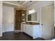 Elegant bathroom with a glass door shower and a vanity with granite counters at 3450 Camellia Ln, Suwanee, GA 30024