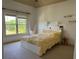 Cozy bedroom features natural lighting and neutral tones, creating a relaxing retreat at 3450 Camellia Ln, Suwanee, GA 30024