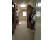 A walk-in closet with ample storage for clothing and a window for natural light at 3450 Camellia Ln, Suwanee, GA 30024