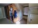 A walk-in closet with custom built-in shelves, window bench and storage for accessories at 3450 Camellia Ln, Suwanee, GA 30024