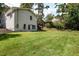 Sprawling backyard with mature trees at 1377 Oak Grove Dr, Decatur, GA 30033