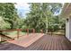 Spacious wood deck overlooking the private backyard at 1377 Oak Grove Dr, Decatur, GA 30033