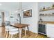 Stylish dining area with modern lighting and a bar area at 1377 Oak Grove Dr, Decatur, GA 30033