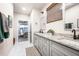 Elegant bathroom with double vanity and a view of bedroom at 648 Glendale Rd, Scottdale, GA 30079