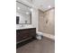 Bathroom with herringbone floor and walk-in shower at 5040 Harrington Rd, Johns Creek, GA 30022