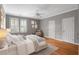 Bedroom with hardwood floors and gray walls at 5040 Harrington Rd, Johns Creek, GA 30022