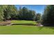 View of a lush green golf course at 5040 Harrington Rd, Johns Creek, GA 30022