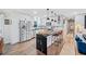 Modern kitchen with white cabinets and large island at 179 Village Dr, Hiram, GA 30141