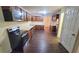 Kitchen with stainless steel appliances and wood cabinets at 1081 Avonridge Ct, Stone Mountain, GA 30083