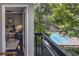Balcony view of community pool and lush green landscape at 2212 River Green Nw Dr, Atlanta, GA 30327