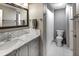 Modern bathroom with marble countertops and a spacious shower at 2212 River Green Nw Dr, Atlanta, GA 30327