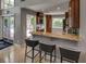 Community kitchen with granite countertops and bar seating at 2212 River Green Nw Dr, Atlanta, GA 30327