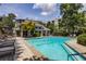 Inviting community pool with surrounding lounge chairs and landscaping at 2212 River Green Nw Dr, Atlanta, GA 30327