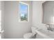 Simple bathroom with white sink and toilet at 3750 Willingham Sw Run, Marietta, GA 30008