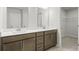 Double vanity bathroom with a large mirror and plenty of counter space at 3750 Willingham Sw Run, Marietta, GA 30008