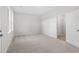 Bright and airy bedroom with neutral walls and carpet at 3750 Willingham Sw Run, Marietta, GA 30008