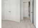 Spacious bedroom with double doors and carpet at 3750 Willingham Sw Run, Marietta, GA 30008