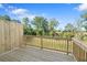 Wooden deck with view of trees and grassy area at 3750 Willingham Sw Run, Marietta, GA 30008