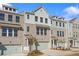 Three-story townhouses with attached garages at 3750 Willingham Sw Run, Marietta, GA 30008