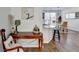Dining area showcasing granite counter, seamlessly connecting to the dining area with natural light at 3676 Chattahoochee Summit Dr, Atlanta, GA 30339