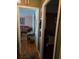 Long hallway with hardwood floors and access to other rooms at 3751 Amber Nw Rd, Atlanta, GA 30331